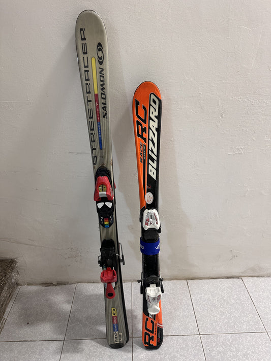 sci bambino Blizzard e Salomon misura rispettivamente 110cm e 130cm.